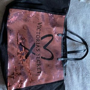 Victoria’s Secret duffle bag.